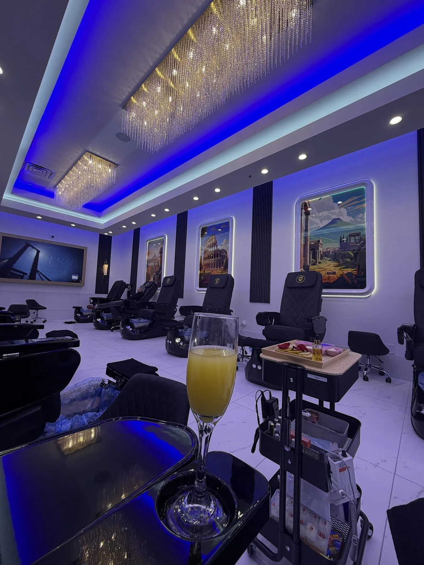 A complimentary mimosa beside the spa pedicure chairs