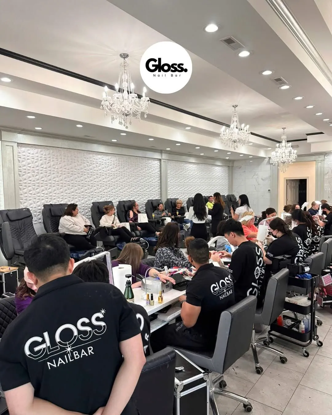The Gloss Nail Bar team caring for guests inside the Rockford flagship salon